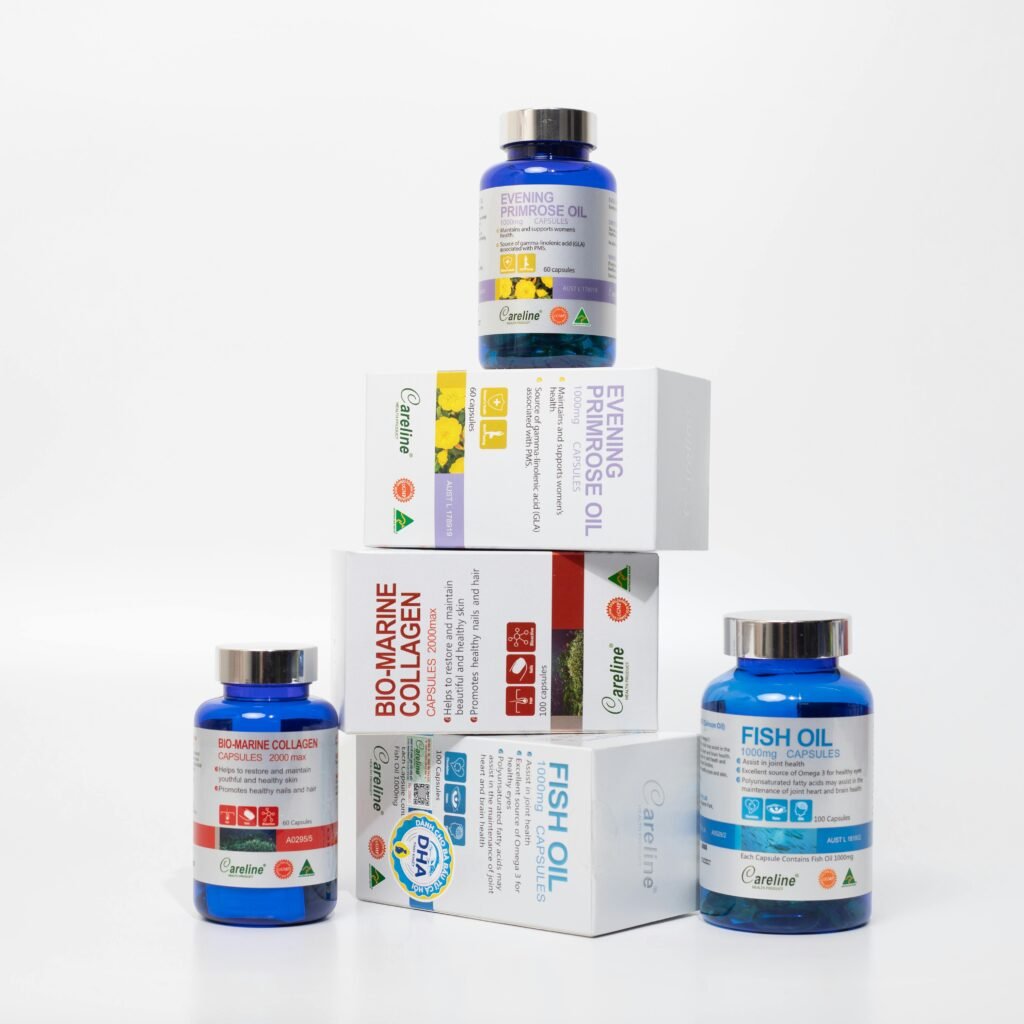 Stack of health supplements including fish oil and collagen bottles with white background.